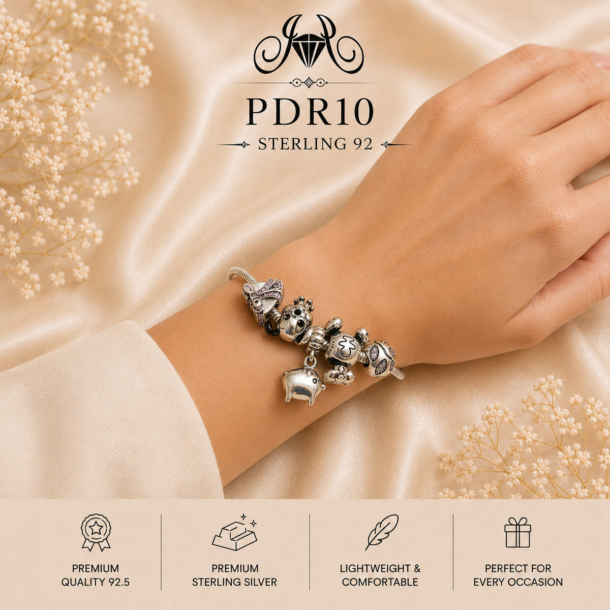 PDR10 92.5 Sterling Silver Charm Bracelet wearing view