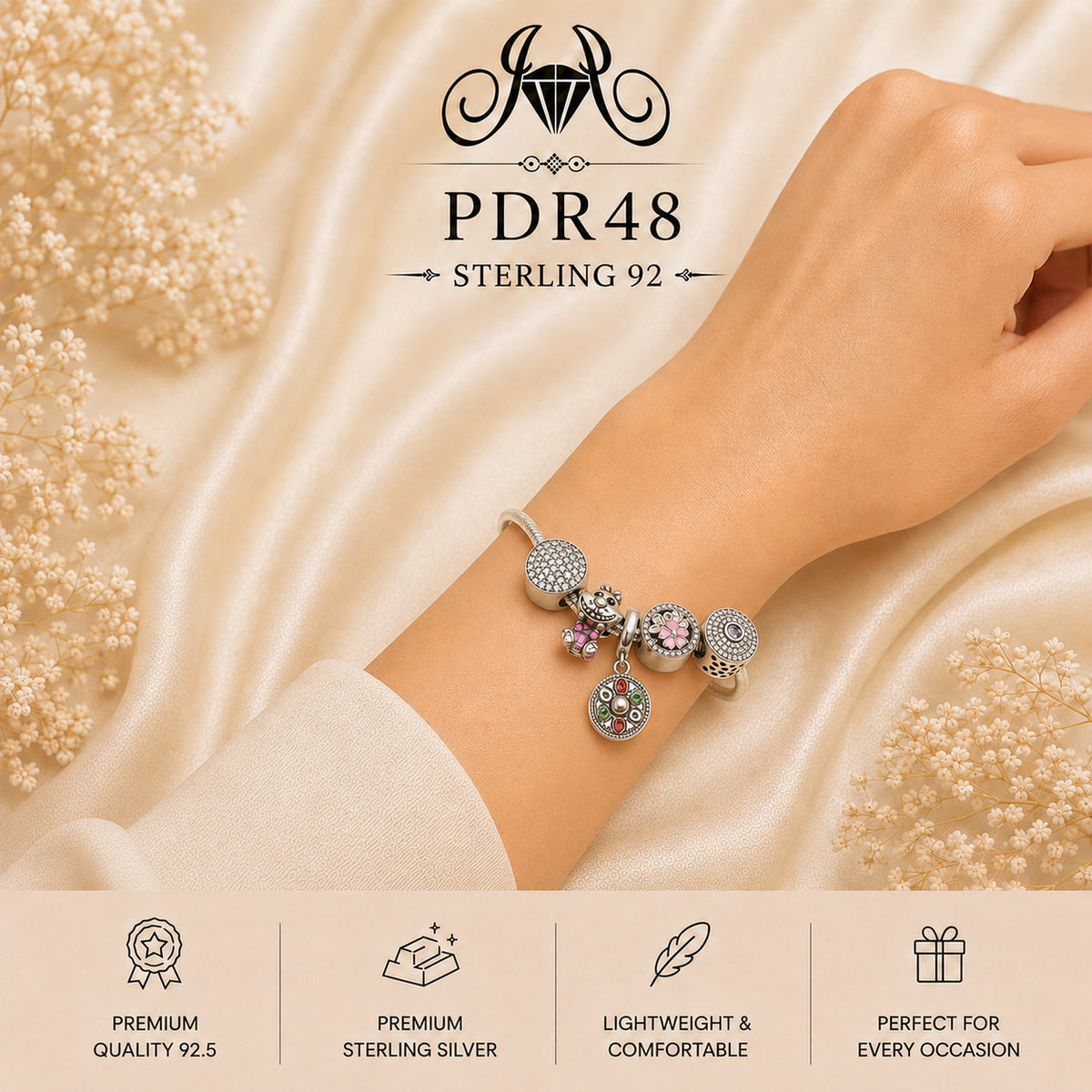 PDR48 92.5 Sterling Silver Charm Bracelet wearing view