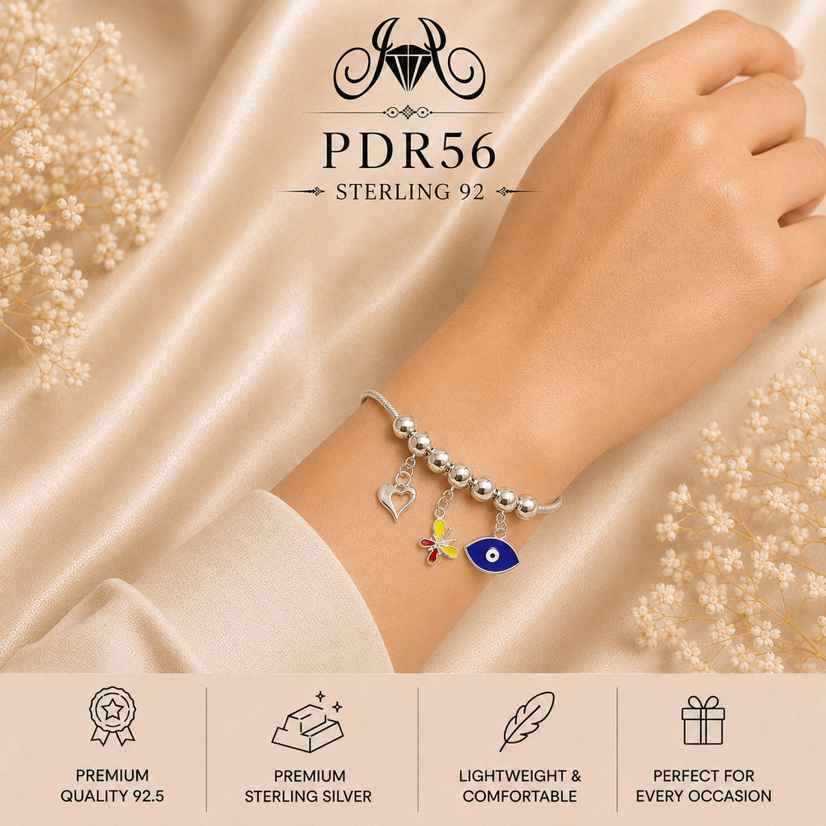 PDR56 92.5 Sterling Silver Charm Bracelet wearing view