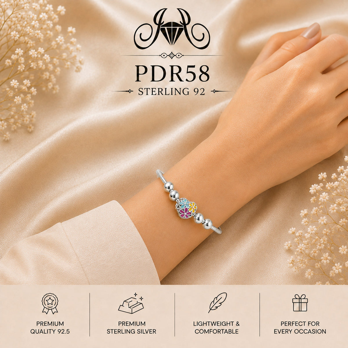 PDR58 92.5 Sterling Silver Charm Bracelet wearing view