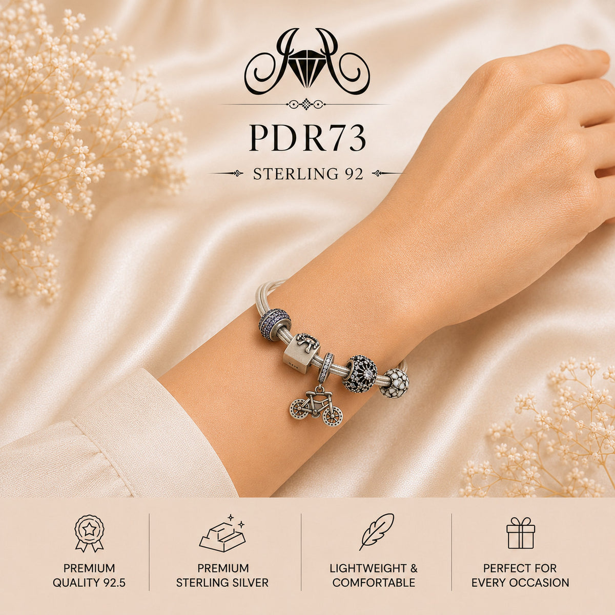 PDR73 92.5 Sterling Silver Charm Bracelet wearing view