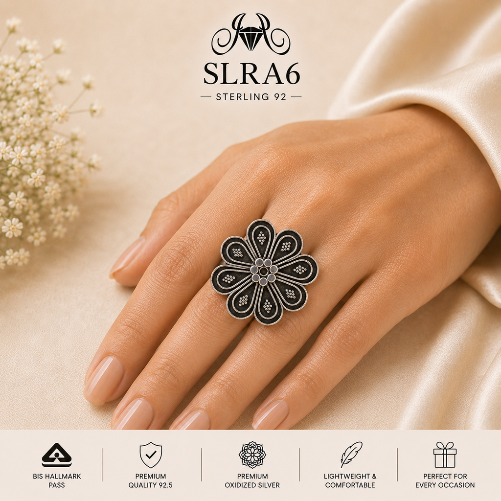 SLRA6 oxidized sterling silver floral ring worn on hand