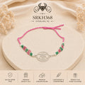 SRKH368 circular symbol sterling silver rakhi front view